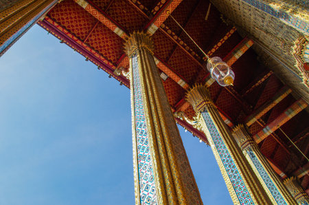 Thai style temple with blue sky background, Wat Pho, Bangkok, Thailandの写真素材