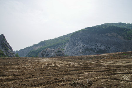 Plowed field in the mountains. Landscape of the mountains.の写真素材
