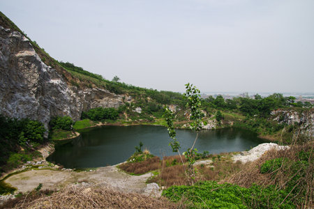 Landscape view of a small lake in the middle of the forestの写真素材
