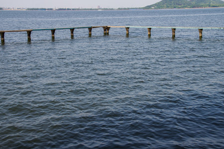 Wooden jetty on the lake, closeup of photo.の写真素材