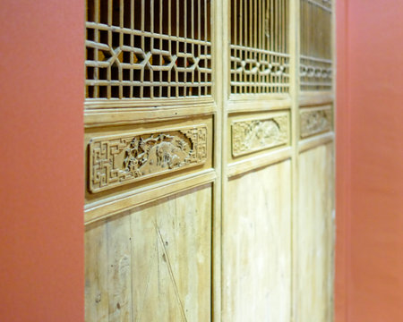 Wooden door in the Chinese temple, closeup of photo.の写真素材