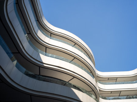 Modern architecture, detail of a modern building, blue sky background.の写真素材