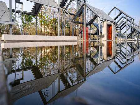 Reflection of the structure in the water of the pondの写真素材