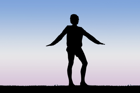 silhouette of man women on sky background with sunset or sunriseの写真素材