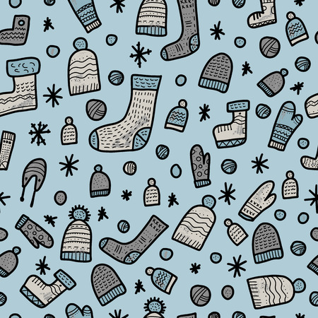 Seamless pattern of warm socks, beanies, gloves. Endless background. Vector illustration.のイラスト素材