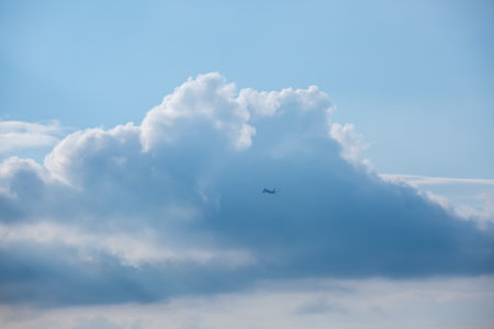 A plane is rushing into the sky, heading into the distance.の写真素材