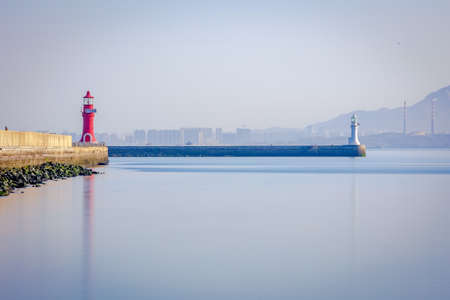 The unique landscape of the coastal city, the lighthouse, is a beacon that guides people home.の写真素材