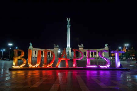 Colorfully lit wooden installation of letters forming the word Budapest on Heroes' Square, on April 18 , 2016 in Budapest, Hungary. The attraction related to and promote Budapest Spring Festival.のeditorial素材
