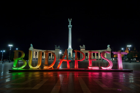 Colorfully lit wooden installation of letters forming the word Budapest on Heroes' Square, on April 18 , 2016 in Budapest, Hungary. The attraction related to and promote Budapest Spring Festival.のeditorial素材