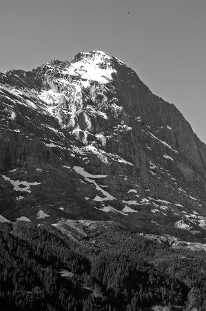 Eiger, Swiss Alps - snow capped mountains and deep valleys, stunning view, breath-taking panoramaの写真素材