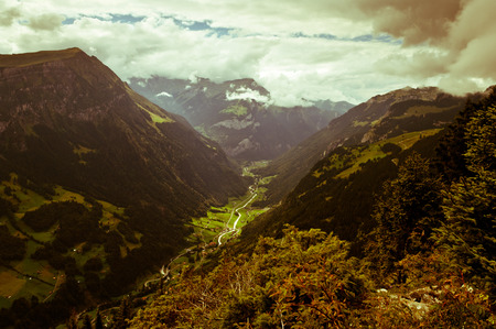 Swiss Alps - snow capped mountains and deep valleys, stunning view, breath-taking panoramaの写真素材