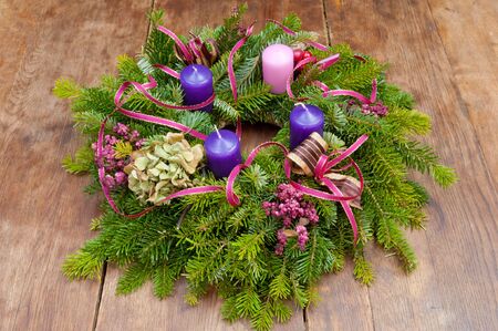 Christmas wreath advent wreath on wooden background with copy spaceの写真素材