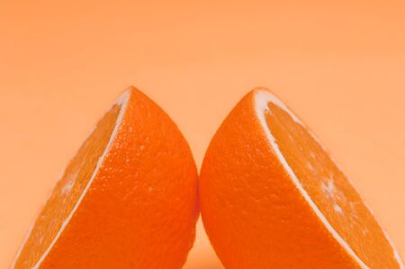 Orange pattern on orange colored background citrus arrangementの写真素材