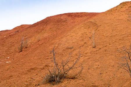 Bauxite mine, raw weathered bauxite sedimentary rock on surface