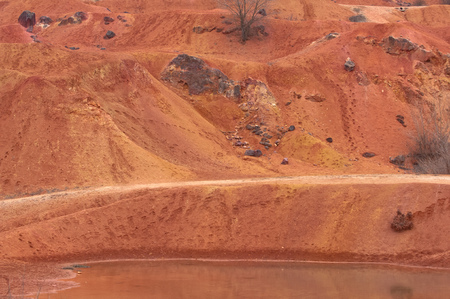 Bauxite mine, raw weathered bauxite sedimentary rock on surfaceの写真素材
