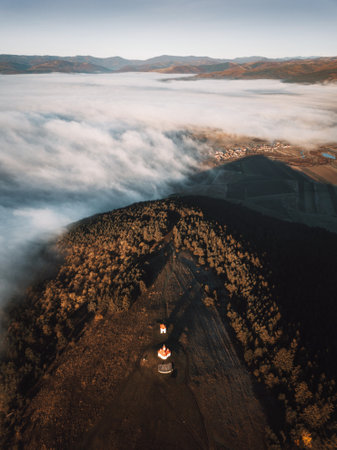 Aerial view of a landscape with fog and mist.の写真素材