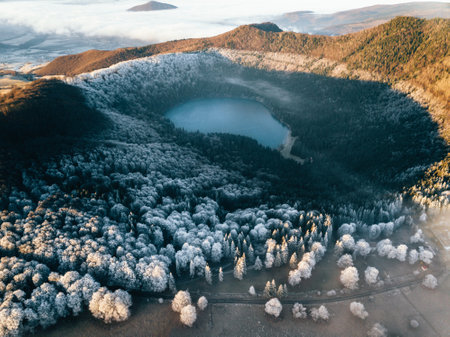 Aerial view of beautiful winter landscape with frozen lake in the mountainsの写真素材