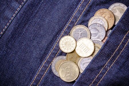 Metal coins in pocket.の写真素材