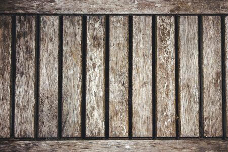 Grunge dirty old wooden desk board background.
