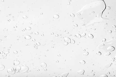 Bubble gel texture. White fizzy water background. Health spa backdrop. Air bubbles distressed pattern for graphic design.の写真素材