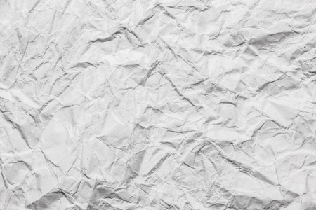 Crumpled white paper texture.の写真素材
