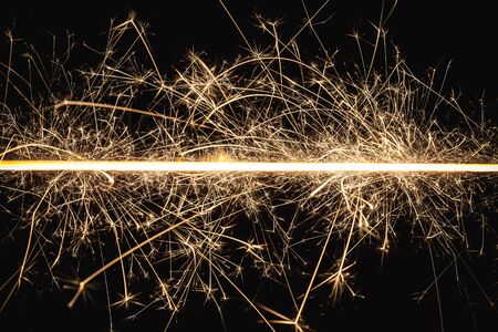 New years eve sprakler fire background.