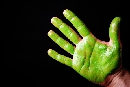 Hand painted with saturated color isolated on black background.の写真素材