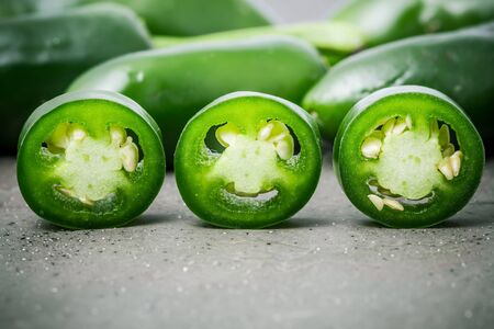 Jalapeno pepper hot green background.の写真素材