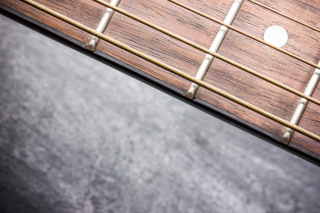 Grunge guitar fret board background.の写真素材
