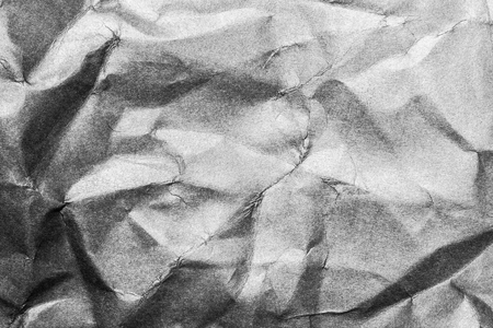 Crumpled gray white soft paper texture.の写真素材