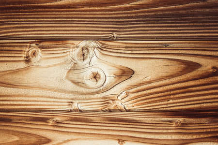 Aged natural wood texture with knot.の写真素材