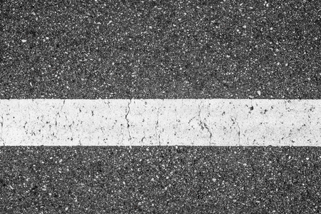Old asphalt road sign.