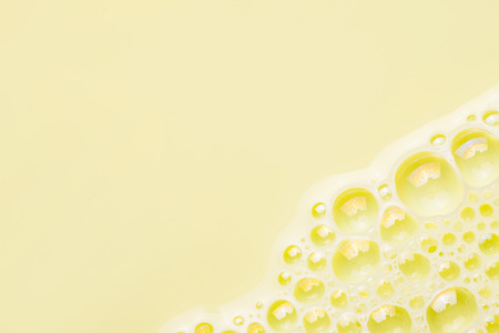 Yellow foam bubble texture.の写真素材