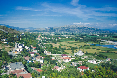 Albania Shkoder city seen from the top of the mountain. Beautiful landscape during sunny summer day.の写真素材