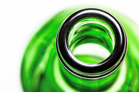 Green wine bottle top view of the neck with shallow depth of field.の写真素材