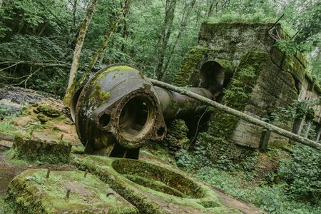 Abandoned dirty rusty metal pipe industrial background.の写真素材