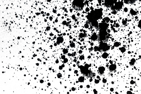 Grunge distressed splatter background with spray paint drops. Black ink splashes.の写真素材