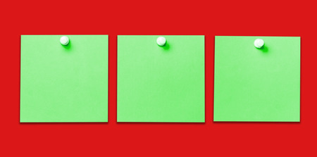 Three memo cards in a row. Office reminder wall isolated with shadow background.の写真素材