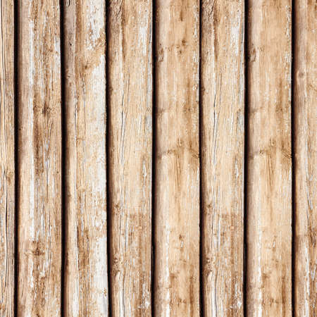 Grunge wood texture. Raw brown wooden wall background. Rustic tree desk with knots pattern. Countryside architecture wall. Village building construction.の写真素材