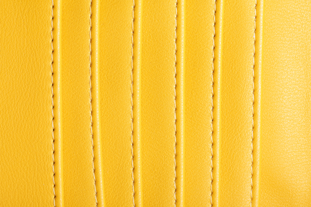 Yellow leather small wallet pockets texture.の写真素材
