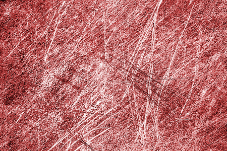 Red color grunge scratched metal texture.の写真素材