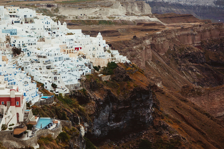Santorini island small city white houses on cliff landscape.の写真素材