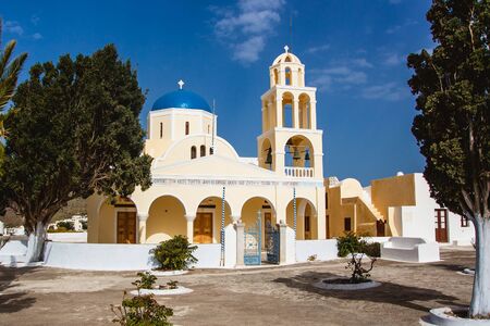 St. Saint George Orthodox Church in Oia Santorini. Summer holiday in Greece. Religious tourism - sightseeing church.のeditorial素材