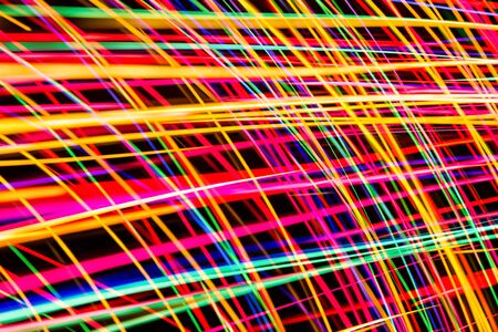 Modern art background. Long exposure neon lights texture. Colorful glow lines backdrop for graphic...
