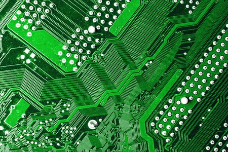 Green circuit board. Electronic device macro background. Micro chip motherboard design. Data...