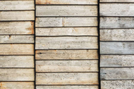 Grunge wood texture. Raw brown wooden wall background. Rustic tree desk with knots pattern....