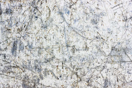 Scratched metal texture. Peeling paint background. White rusty brushed iron sheet. Cracked steel...