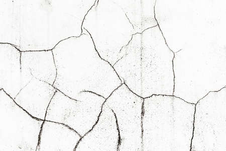 White paint black cracks background. Scratched lines texture. White and black distressed grunge concrete wall pattern for graphic design. Peel paint crack. Weathered rustic surface. Dry paint overlay.の写真素材