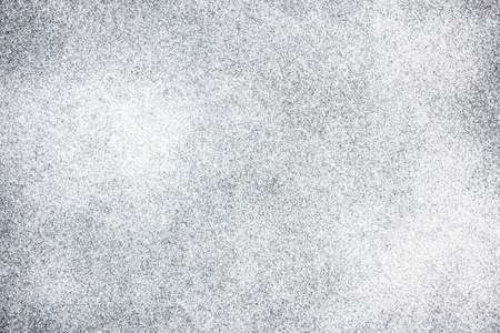 White spray paint on black paper. Noise background. Grain texture overlay. Distressed splatter...