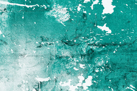 Spray paint wall. Grunge funky pattern. Splatter texture. Peeling paint concrete wall. Graffiti closeup detail. Urban city art background.の写真素材